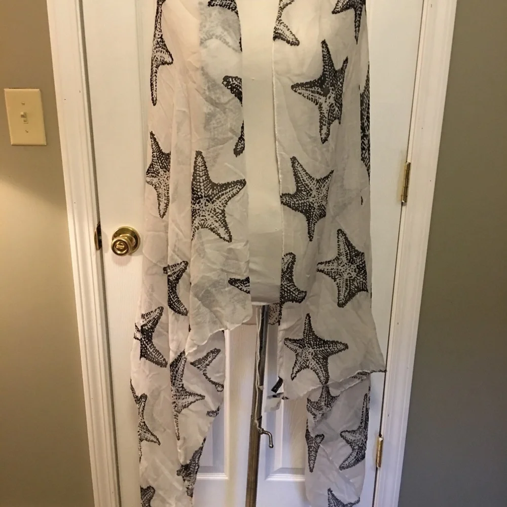 No brand name on this novelty scarf wrap. Is NWT. Sea star, starfish print.